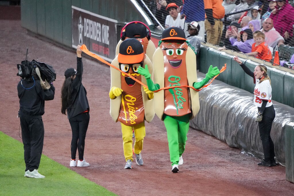 Mustard, Relish and Ketchup compete in a live Hot Dog Race during a game between the Baltimore Orioles and the St. Louis Cardinals at Oriole Park at Camden Yards in Baltimore, Md. on Tuesday, May 27, 2025.