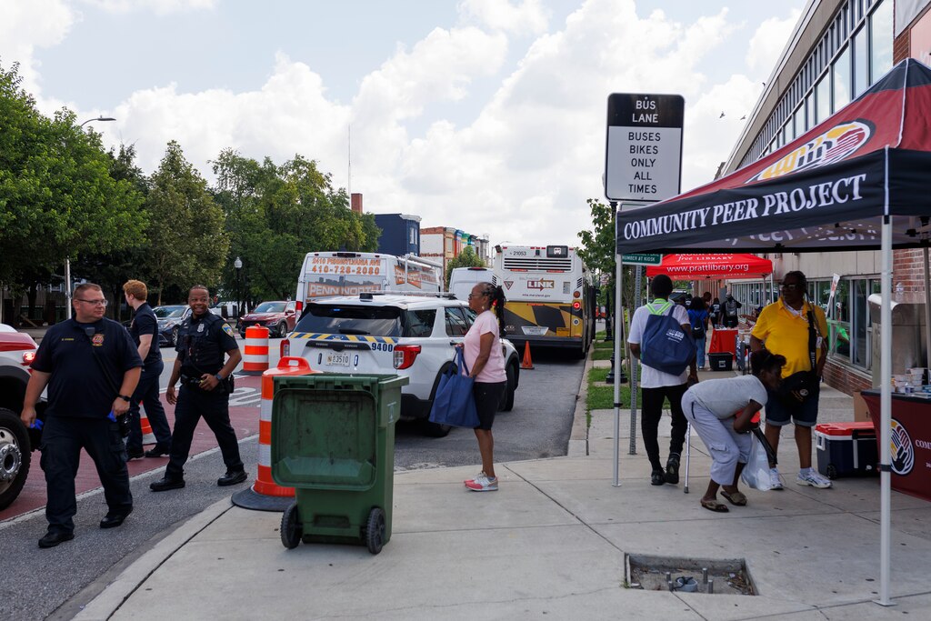 The Penn North neighborhood was full of emergency crews and outreach services on Friday, July 11, 2025 in Baltimore. Just a day following a mass-overdose in the area.