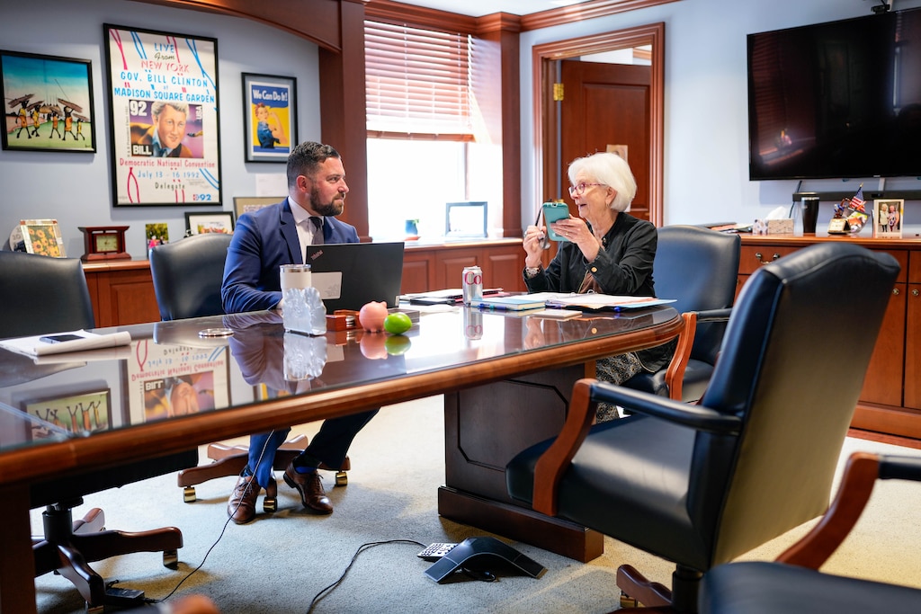Baltimore County Executive Kathy Klausmeier, right, speaks with one of her staffers, Ryan Fried, inside the Baltimore County Historic Courthouse, the county government headquarters, in Towson, Md. on Monday, June 2, 2025.