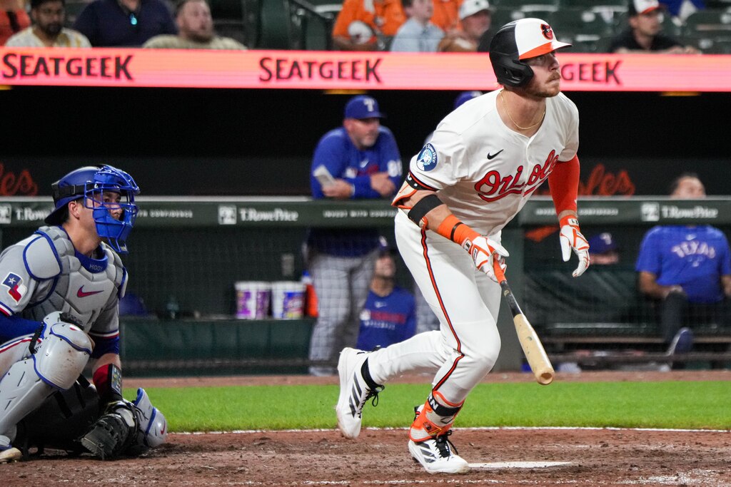 Baltimore Orioles outfielder Ryan O'Hearn (32) connects with a pitch in the 9th inning of a game against the Texas Rangers at Orioles Park at Camden Yards in Baltimore, Md. on Tuesday, June 24, 2025.