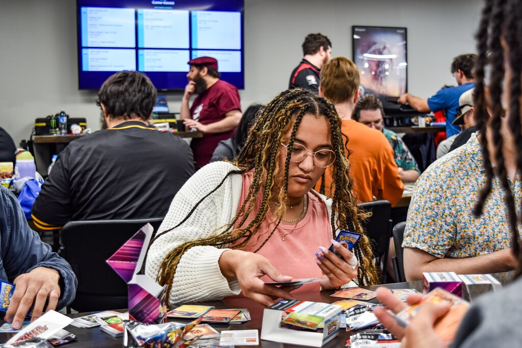 Bryanne Manley builds a deck to play the Pokémon Trading Card Game at Game Haven in Pikesville on Sunday, May 25, 2025.