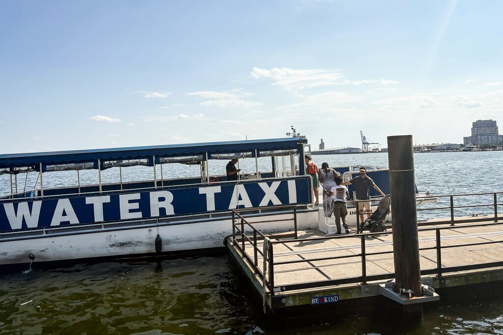 People take a water taxi from the Baltimore Waterfront Promenade on Thursday, July 3, 2025. It touches many of the city’s parks, museums and businesses.