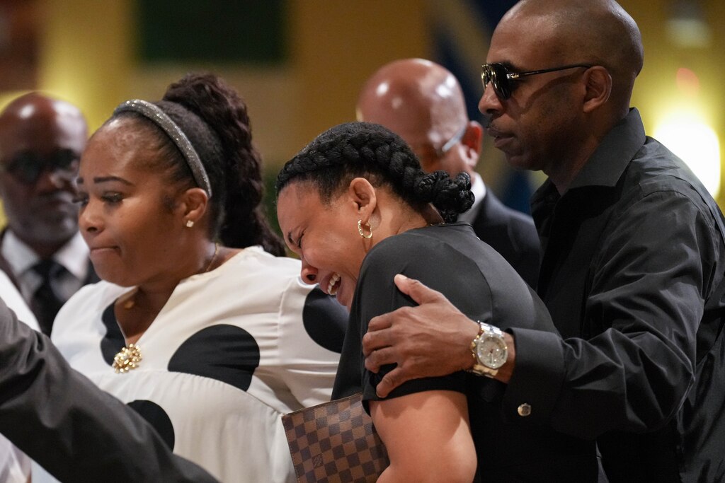 Eleshiea Goode, Dontae Melton Jr.’s mother, reacts as the casket is closed during his funeral at DreamLife Worship Center in Randallstown, Md. on Saturday, July 12, 2025. The 31-year-old died in police custody in June, just one day after his mother had attempted to file an emergency petition in court out of concern for his mental health.