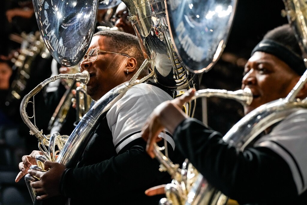 The Shaw University Platinum Sound Marching Band performs during a CIAA women’s basketball quarterfinal game against Claflin University at CFG Bank Arena on Thursday, Feb. 29, 2024.