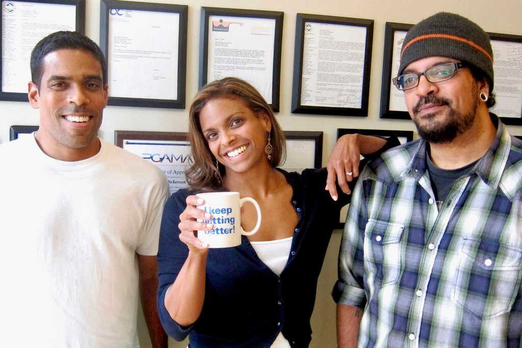 Rayman “Jim” Ally Jr., right, with his siblings David Ally and Debbie Ally-Dickerson.