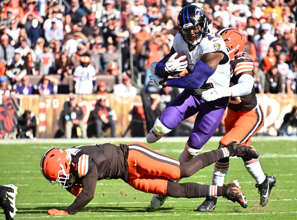CLEVELAND, OHIO - OCTOBER 27: Mohamoud Diabate #43 of the Cleveland Browns tackles Derrick Henry #22 of the Baltimore Ravens in the third quarter of a game at Huntington Bank Field on October 27, 2024 in Cleveland, Ohio. (Photo by Jason Miller/Getty Images)