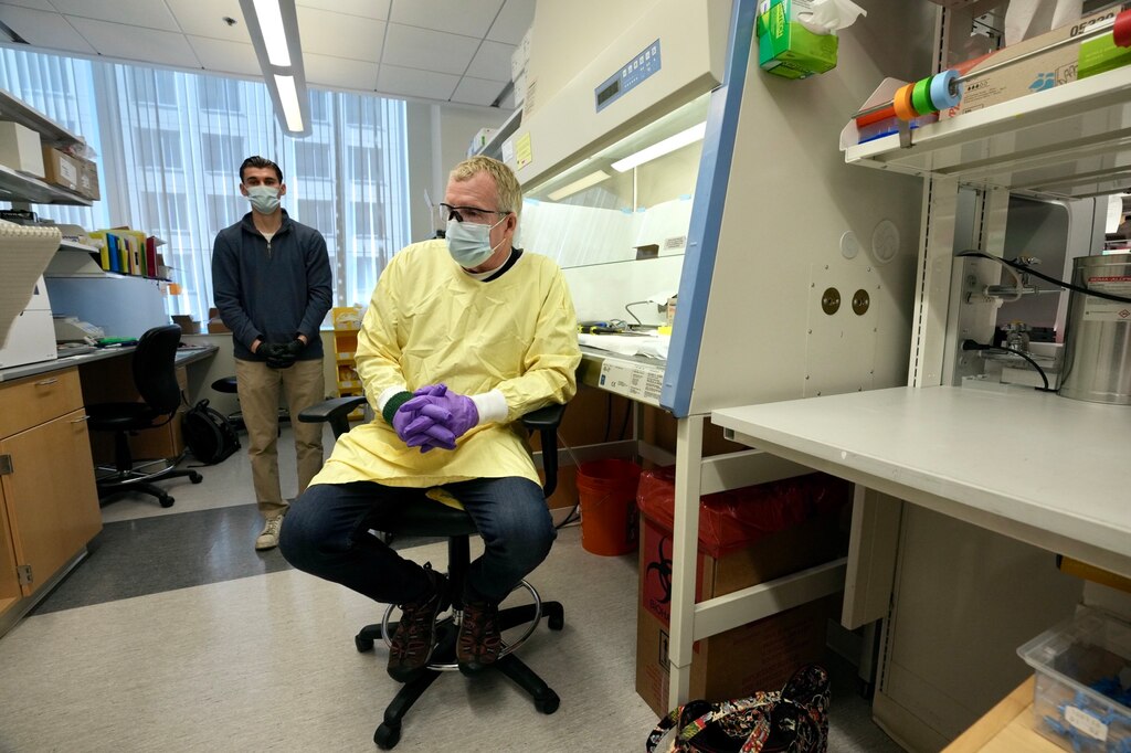 Dr. Tom Hyde, chief medical officer, takes a sample from a donated brain. The Lieber Institute for Brain Development has been working to increase diversity in research, researchers and research subjects and recently got a grant to expand efforts.