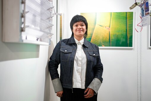 Artist Anna Divinagracia poses for a portrait inside the Scout Art Fair at Artscape in downtown Baltimore, Md. on Saturday, May 24, 2025.