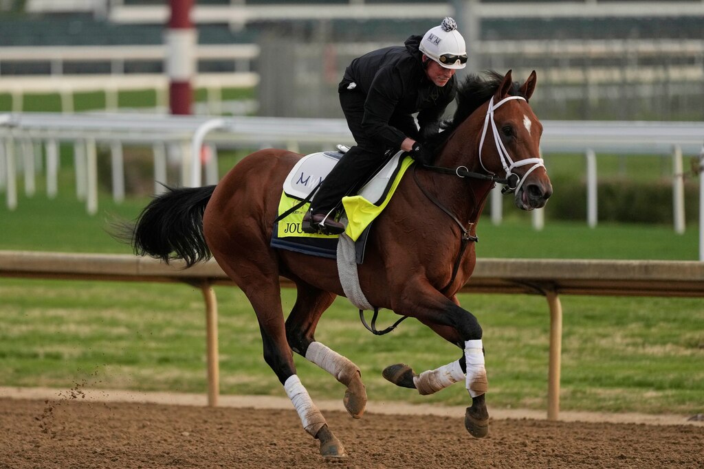 Kentucky Derby entrant Journalism works out at Churchill Downs Thursday, May 1, 2025, in Louisville, Ky. (AP Photo/Charlie Riedel)