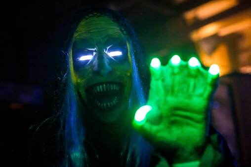 A mechanical witch screeches at guests during a haunted tour of the SS John W. Brown in Baltimore on Friday, October 18, 2024.