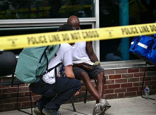 An overdose victim is treated in the triage area near Penn North metro station after Baltimore Police and Baltimore City Fire respond to a call for multiple people experiencing overdose symptoms at the intersection of Pennsylvania & North avenues in West Baltimore on Thursday, July 10, 2025.