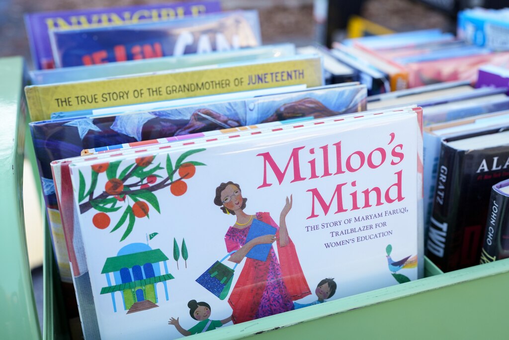 A portable rack of books from the Baltimore County Public Library System’s mobile library truck is seen outside the branch in Rosedale, Md. on Tuesday, November 26, 2024.
