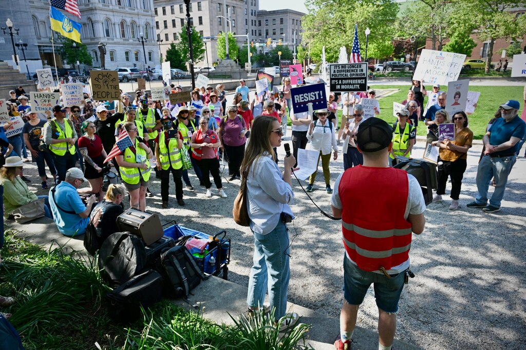 Protesters gather for the "99 vs 1" rally and march at Baltimore's City Hall on May Day, May 1, 2025.