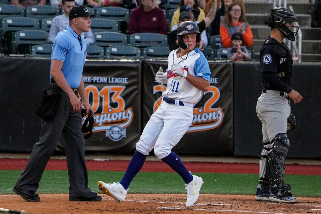 Aberdeen IronBirds shortstop Jackson Holliday (11) runs to home plate, scoring a run in a game against the Hudson Valley Renegades at Leidos Field at Ripken Stadium on Tuesday, May 9. This game against the Renegades was Holliday’s home debut for the IronBirds.