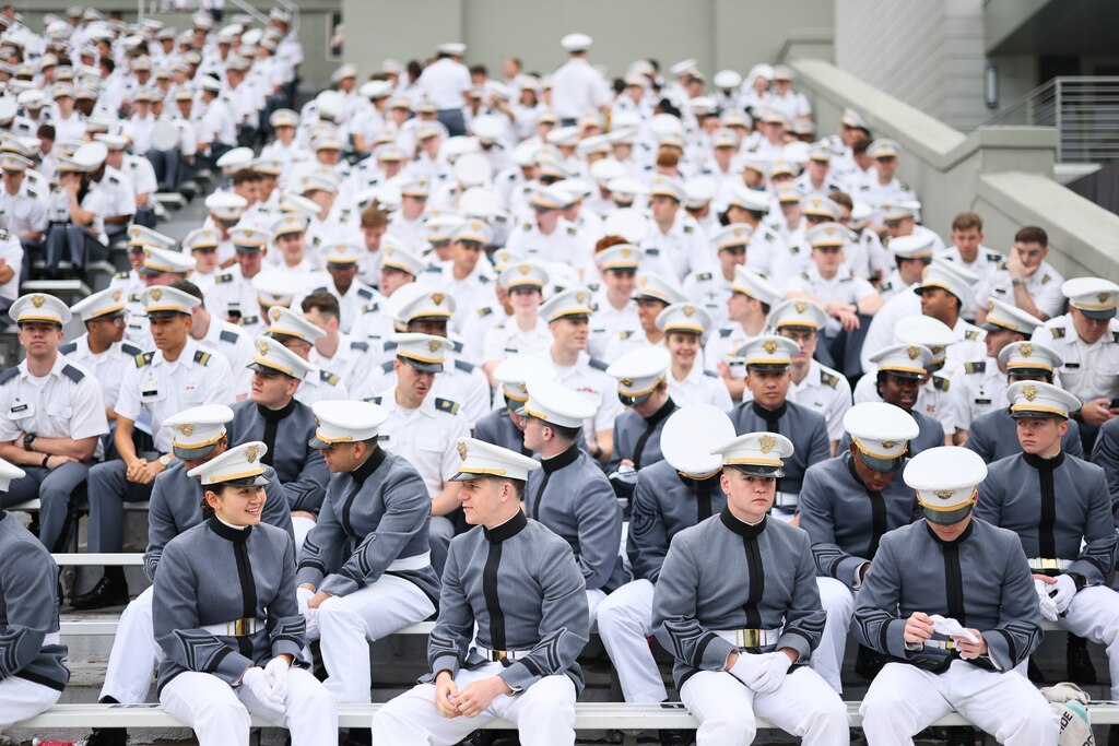 WEST POINT, NEW YORK - MAY 24: Graduates of the United States Military Academy wait in the stands prior to being addressed by President Donald Trump at West Point in Michie Stadium on May 24, 2025 in West Point, NY. Over one thousand cadets are expected to graduate in the same year that the U.S. Army celebrates its 250th birthday. This year's graduating class included honorary member Peter Wang, a junior ROTC cadet who was killed in the 2018 mass shooting at Marjory Stoneman Douglas High School in Parkland, Florida. (Photo by Michael M. Santiago/Getty Images)