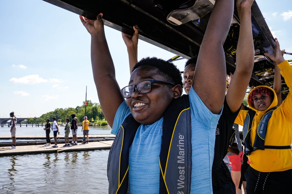 ____ carries the boat out to the water on July 11, 2023.