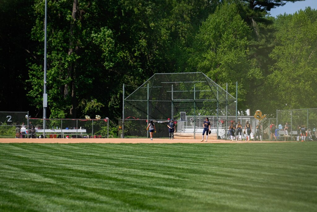 Softball players warm up for practice on one of the athletic fields at Wheaton Regional Park in Silver Spring, Md. on Thursday, May 1, 2025.