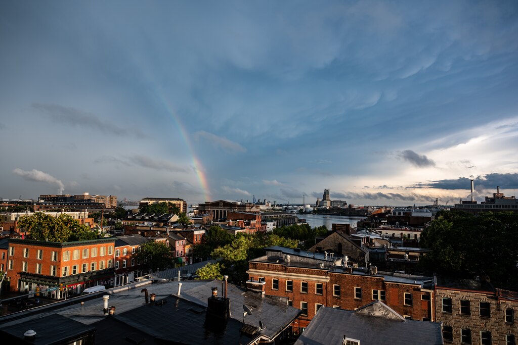 A rainbow arcs over Baltimore after a thunderstorm.