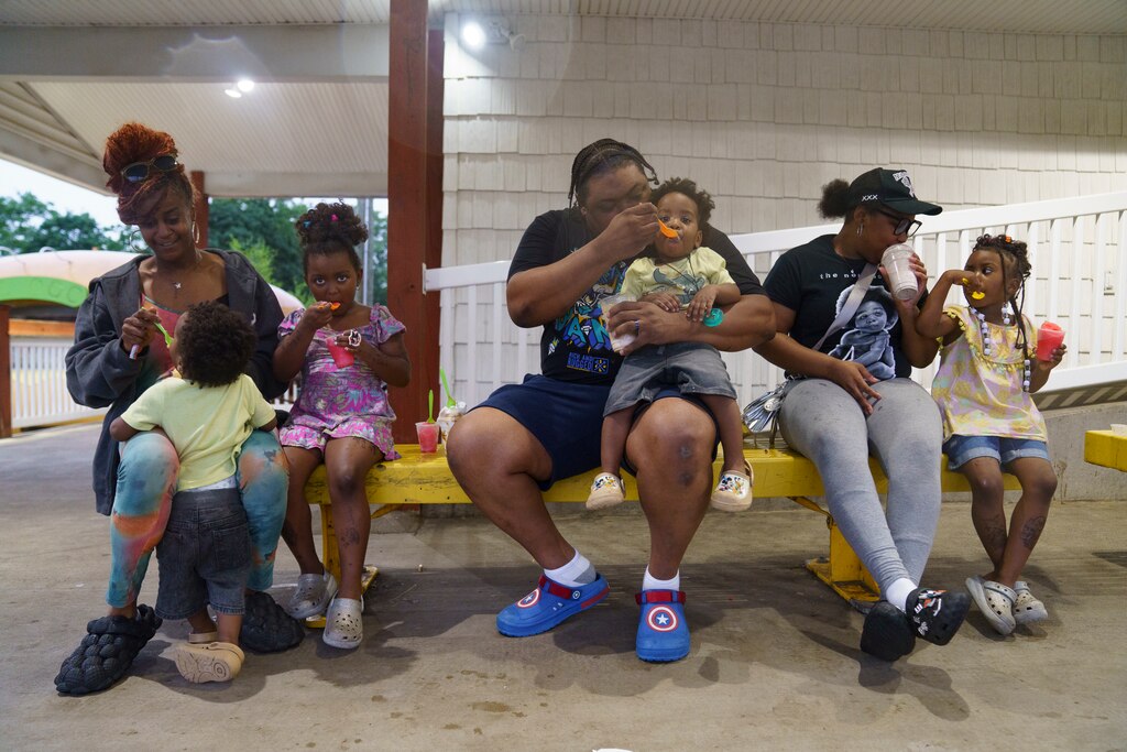 The Claibornes enjoy ice cream all together at The Cow in Reistertown, Md. on July 1, 2025. The family, who is local to the area, said that it is their second time coming.