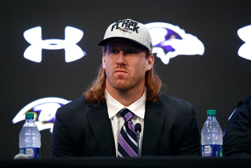 Tight end Hayden Hurst, one of the Baltimore Ravens' first-round draft picks, listens to a reporter's question during an NFL football news conference at the team's headquarters in Owings Mills, Md., Friday, April 27, 2018.