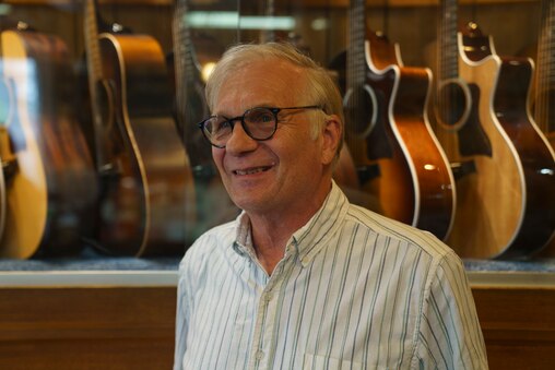 Owner Emory Knode poses for a portrait at the Appalachian Bluegrass Shoppe in Catonsville, Baltimore County, Md. on July 2, 2025.