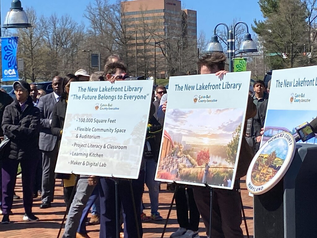 Howard County officials and Gov. Wes Moore unveil plans for a new Columbia library overlooking Lake Kittamaqundi.