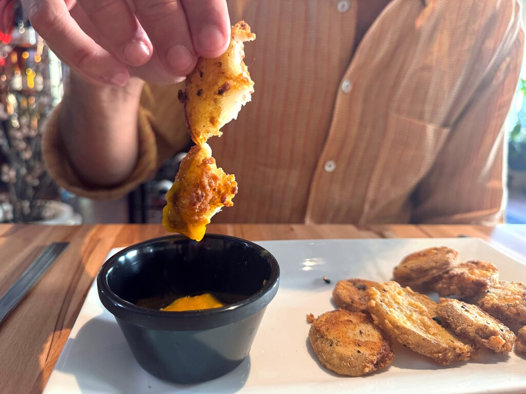 Mojo potatoes are breaded and fried with fruity and citrus dipping sauce that carries some heat on July 15, 2025.