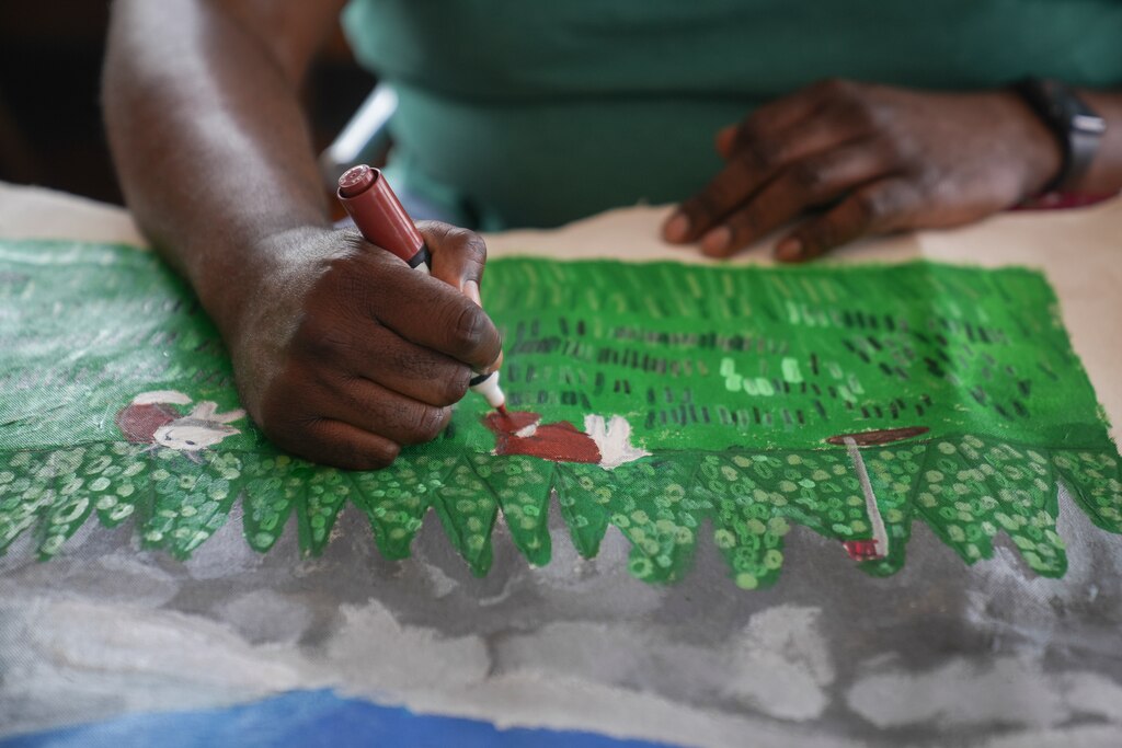 Louis Middleton, an artist at Make Studio in Baltimore, Md. works on an ongoing piece on July 10, 2025.