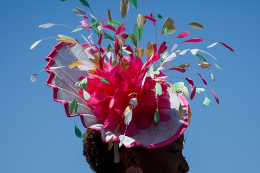 Attendees in ornate hats sprinkle the audience of The Preakness Stakes at Pimlico Race Course on Saturday, May 17, 2025, in Baltimore.