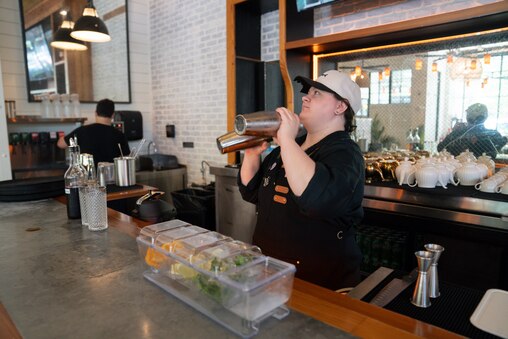 Elliot Zink, bar manager of Lao Lao Sze Chuan in Baltimore, whips up two mocktails on June 26, 2025.