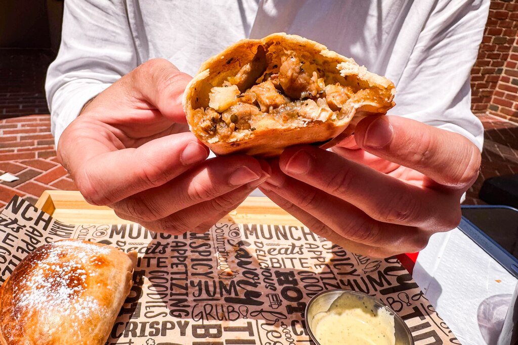 The Anticuchera empanada at Empa511 comes with hand-cut, juicy chicken, caramelized onions and smoked potatoes.