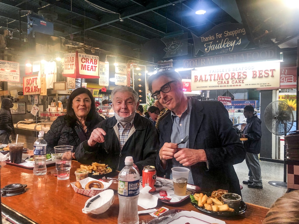 Ira Glass at Lexington Market in Baltimore with his father Barry Glass and sister Randi Murray.