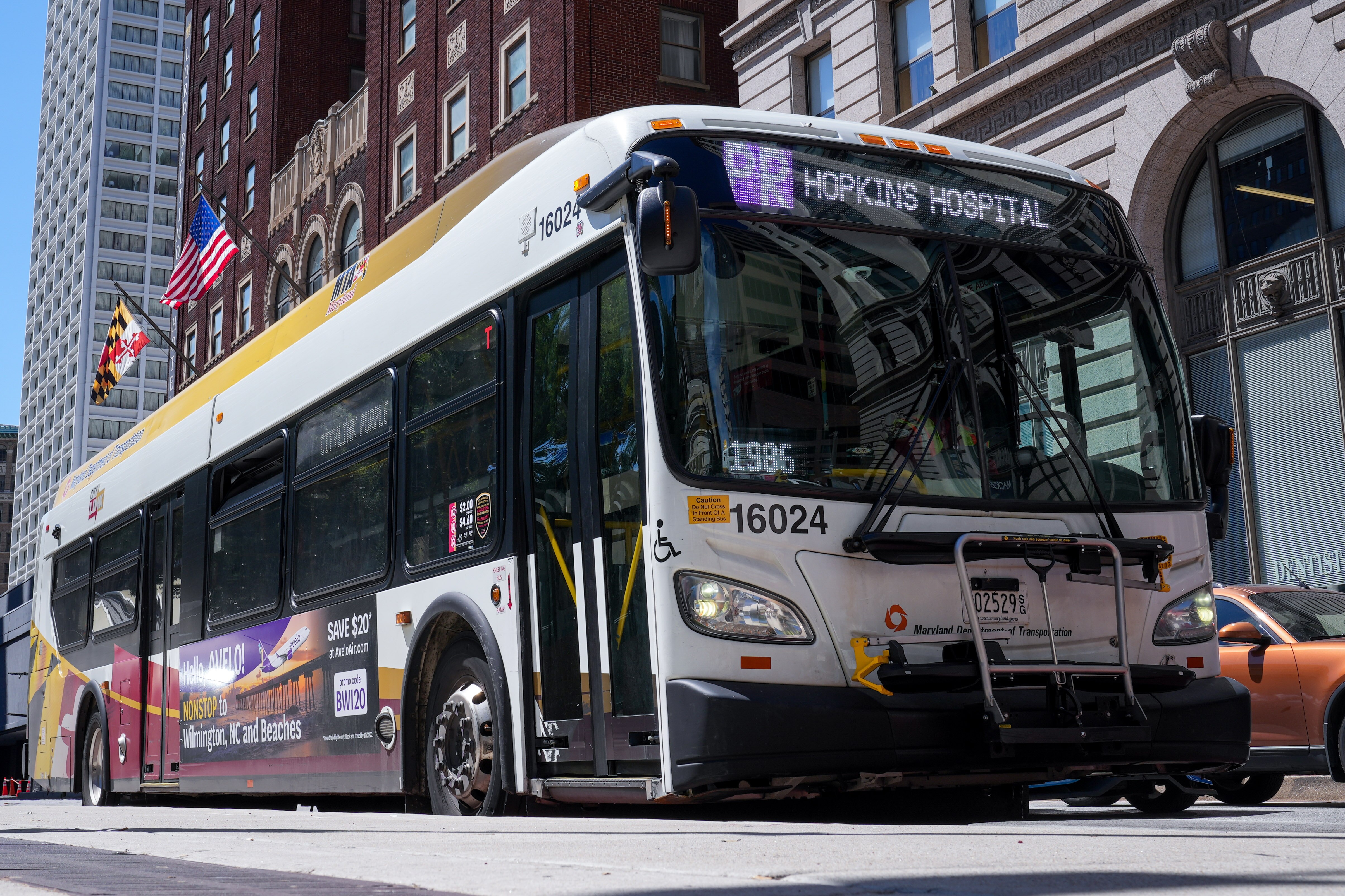 A bus outside Charles Center Station drives along its path on 8/11/22.
