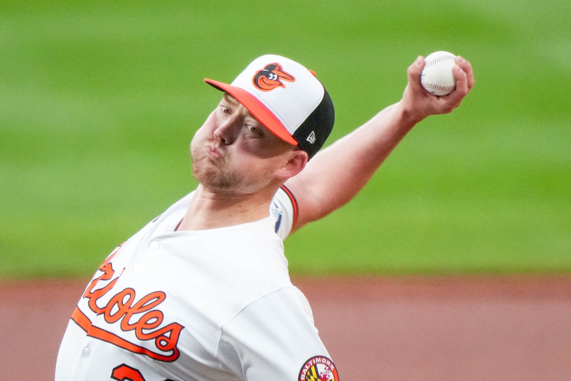 Orioles pitcher Kyle Bradish delivers a pitch in the third inning against the Boston Red Sox on Aug. 26.
