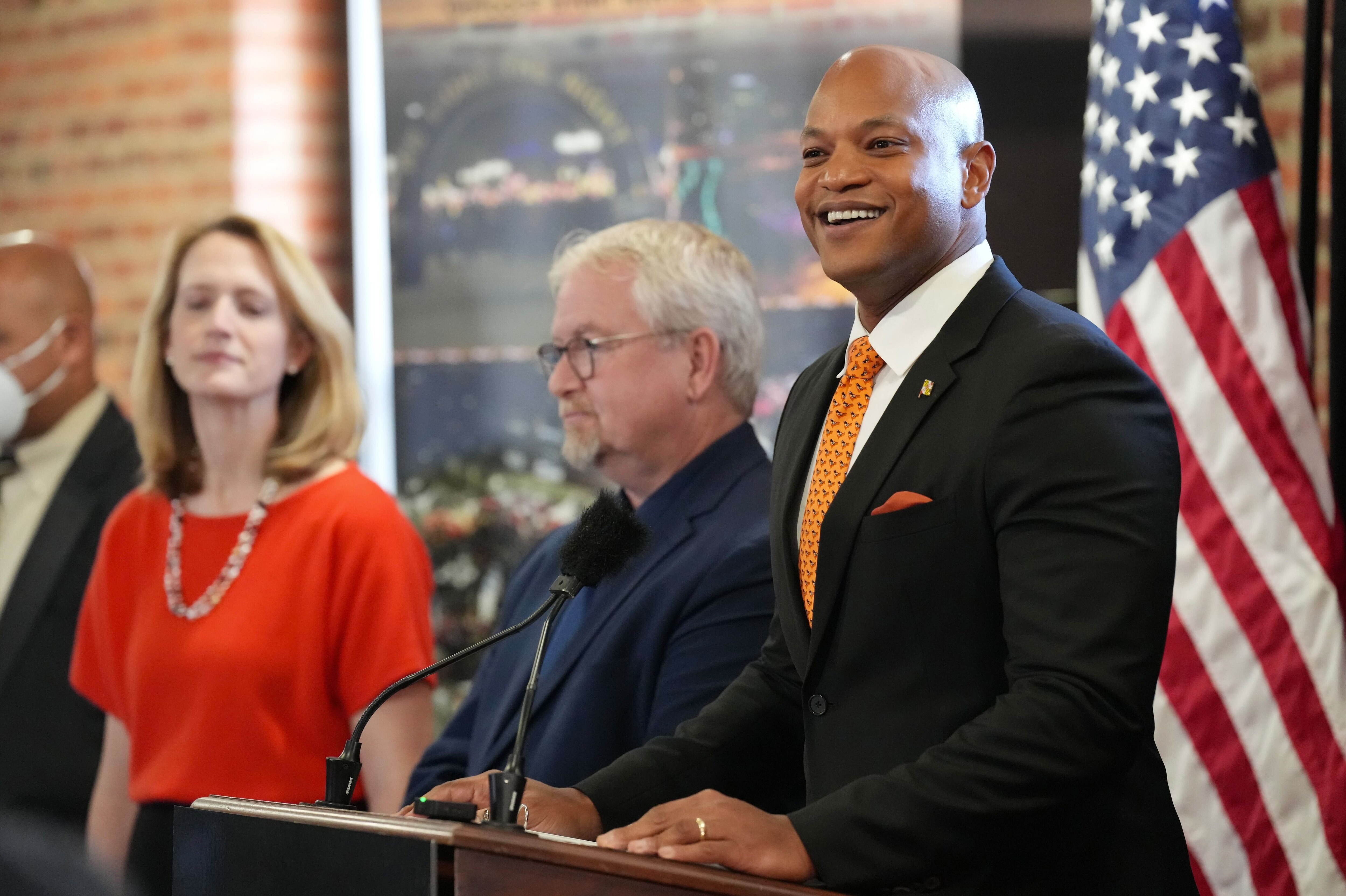 Gov. Wes Moore delivers remarks at a press conference inside the Camden Yards warehouse after the Maryland Stadium Authority voted to extend the Orioles lease at the ballpark on Monday, Dec. 18, 2023