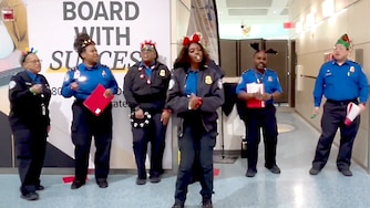 The TSA choir sings a cover of "All I Want For Christmas Is You" at the Baltimore-Washington International Thurgood Marshall Airport.