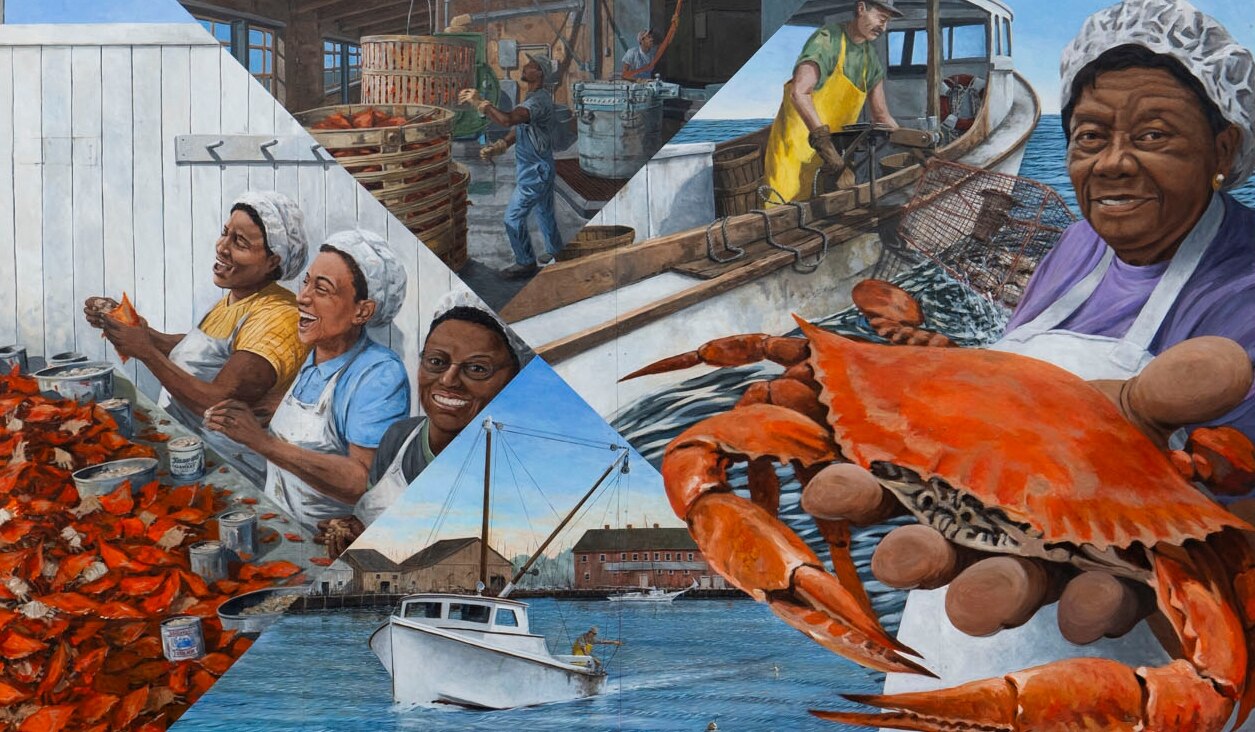 A mural of crab pickers is seen on a wall in Crisfield, MD on June 12, 2024.