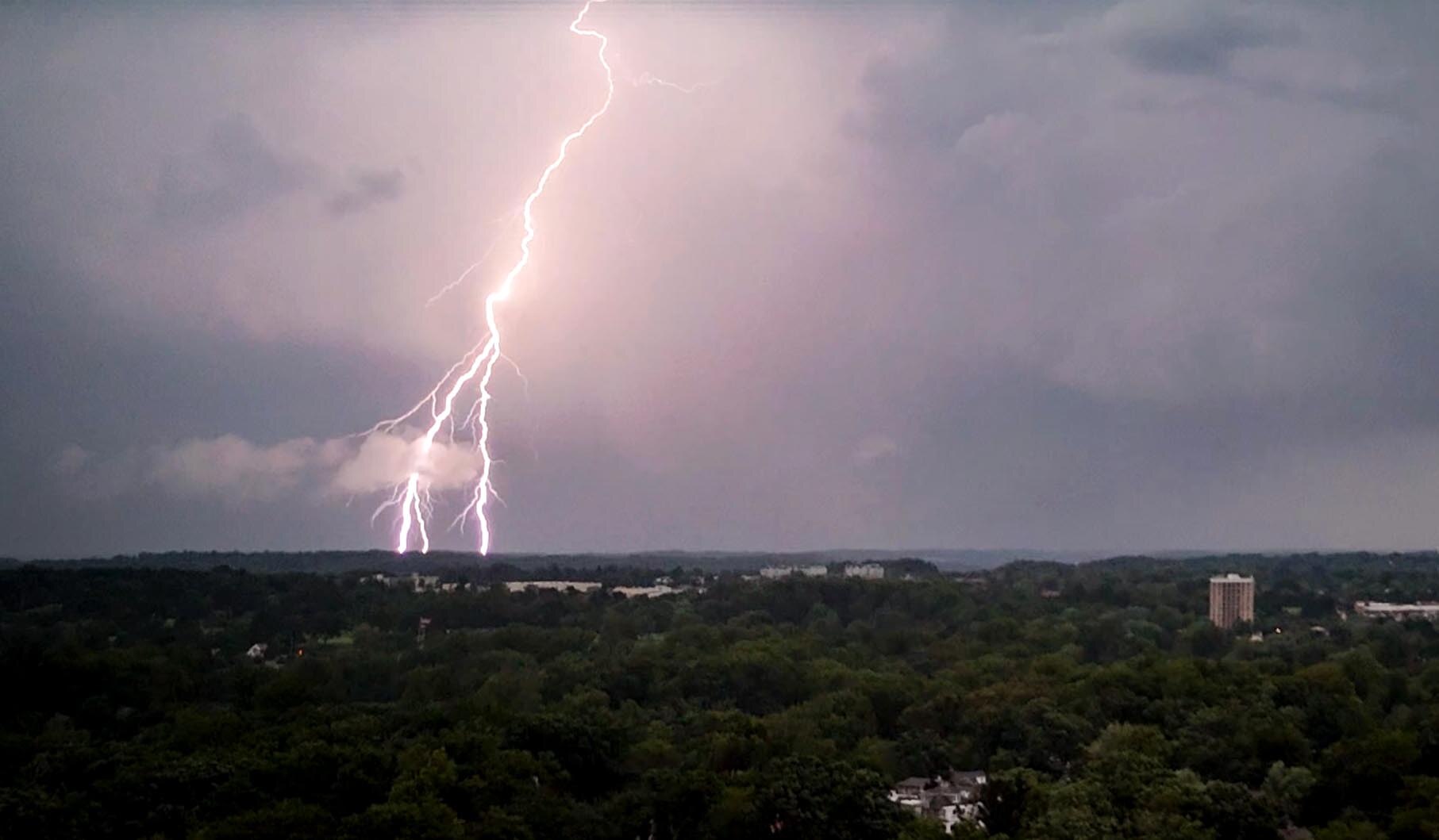 Lightning strikes in northern Baltimore County as a severe thunderstorm moves through, July 8, 2025.
