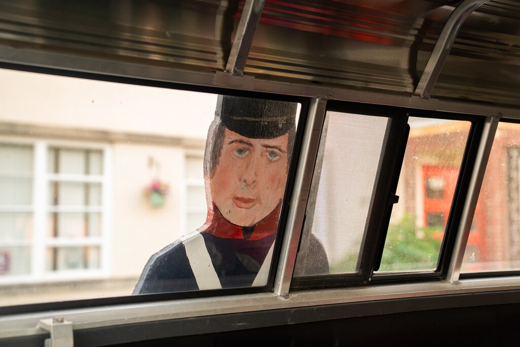 Thursday, Aug. 14, 2025 — A wooden soldier leans against the window of a car at New Light Lutheran Church in Dundalk, Md.