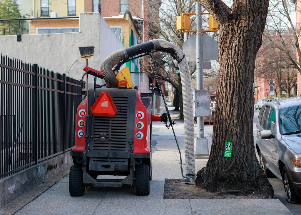 A Midtown Community Benefits District worker drives a Litter Vac in the Bolton Hill neighborhood of Baltimore, MD on March 4, 2025.