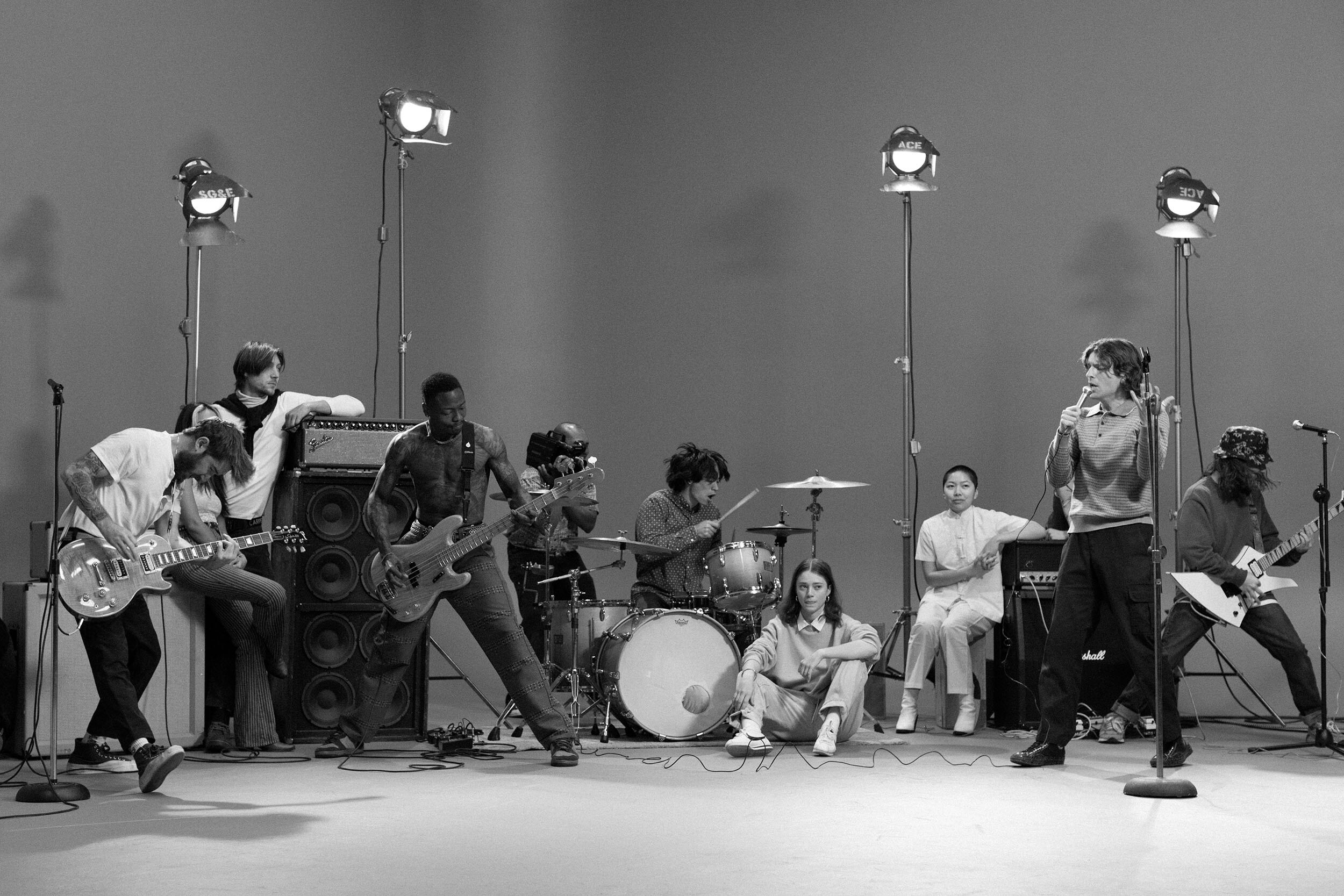 Turnstile, the hardcore band from Baltimore, is pictured performing in a black and white photo.