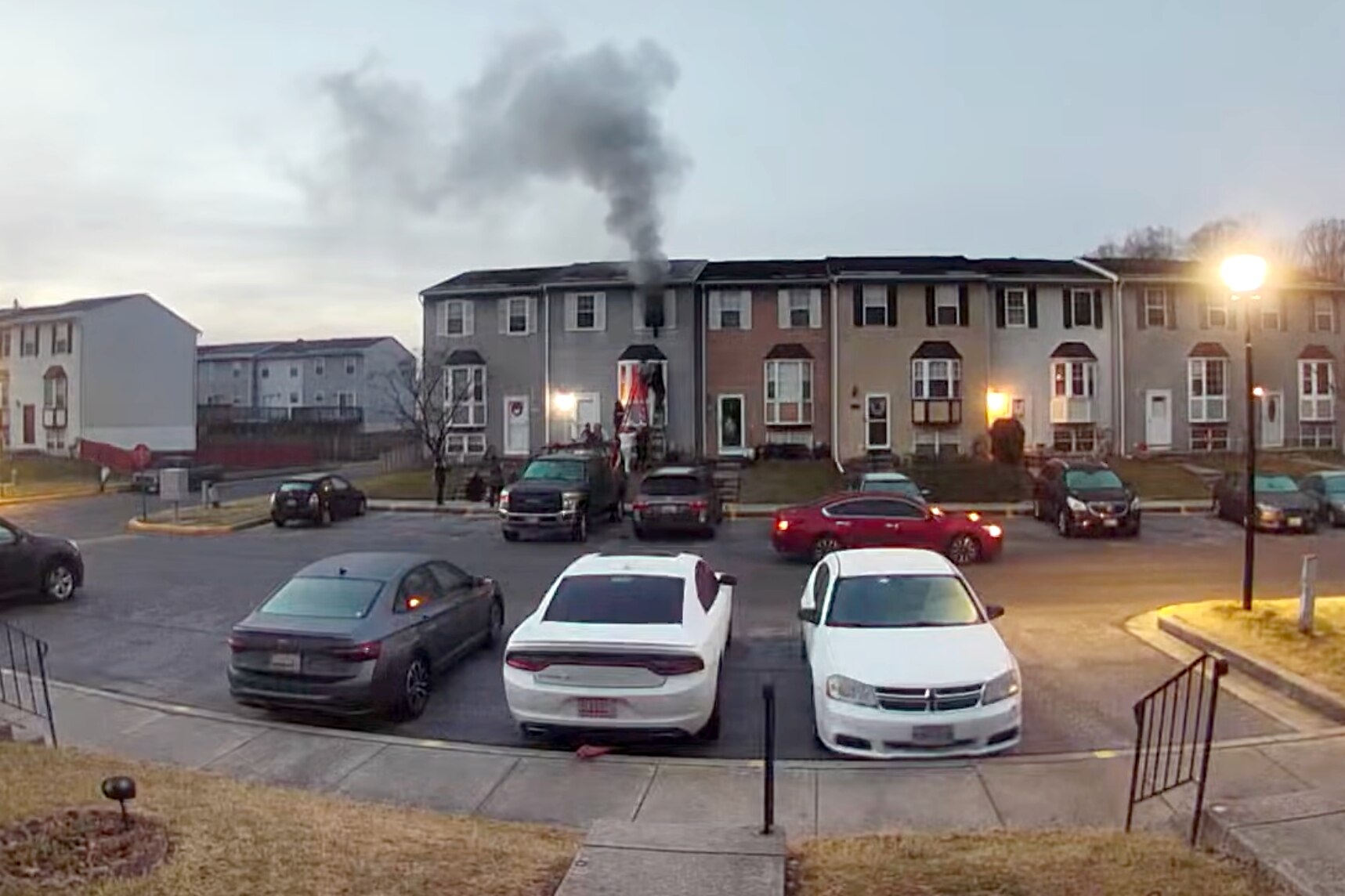 A still from Ring camera footage shows a Middle River rescue of a family from a house fire on January 6, 2026.