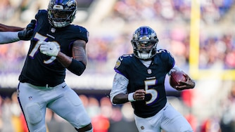 Baltimore Ravens quarterback Tyler Huntley (5) rushes forward, guarded by offensive lineman Ronnie Stanley (79), for a gain in the fourth quarter of a game against the Chicago Bears at M&T Bank Stadium in Baltimore, Md., on Sunday, Oct. 26, 2025.