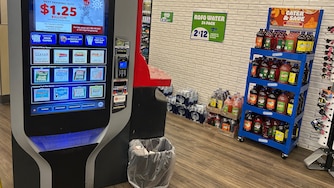 A self-automated lottery machine at a Royal Farms on Light Street in Baltimore displays the $1.25 billion jackpot for the drawing Wednesday, Dec. 17, 2025.