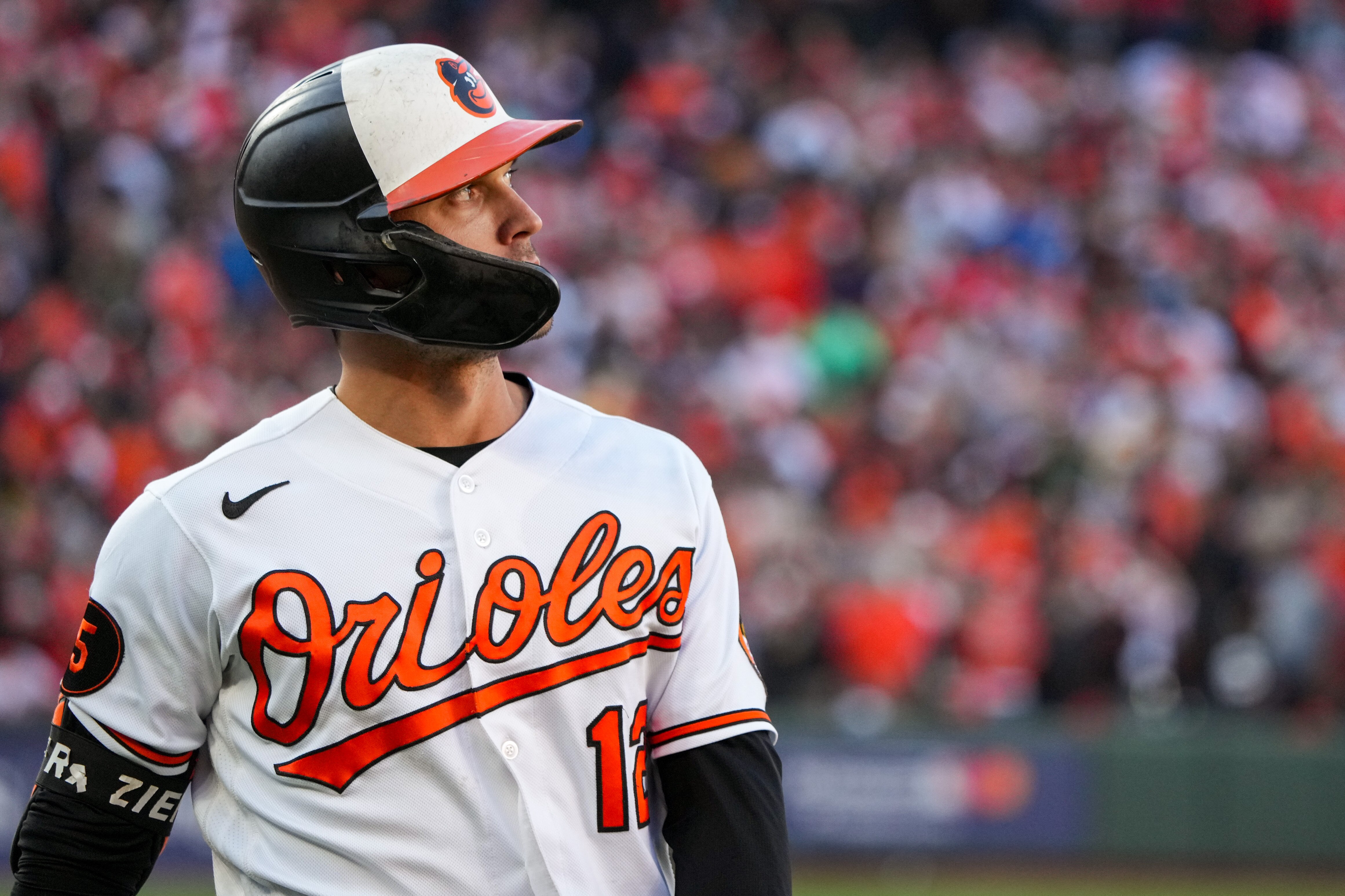 Orioles second baseman Adam Frazier (12) reacts after getting tagged out in the ninth inning as his team loses game one of the American League Divisional Series to the Texas Rangers at Camden Yards on Saturday, October 7, 2023.