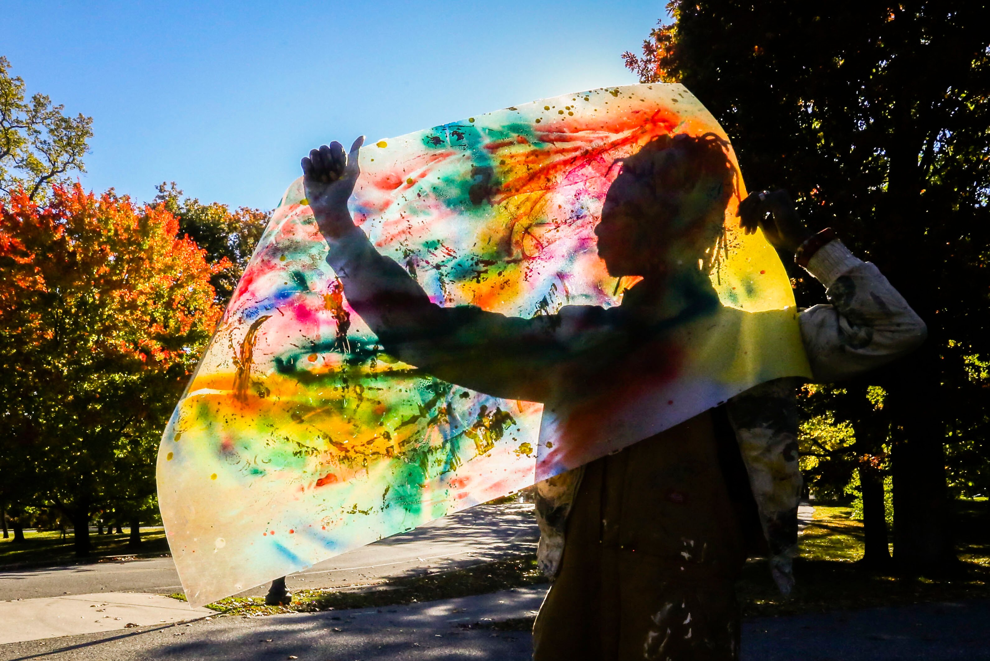 Colin Williams lives in Druid Hill Park and creates a sculpture garden out of a variety of tossed objects he finds such as TVs, glass, wood, mannequins and fabric. Every week he deconstructs his sculptures and creates new ones from the same materials, so the garden is always different. His favorite pieces are made of TV screens and spraypainted;these pieces come to life when the sun shines through them.