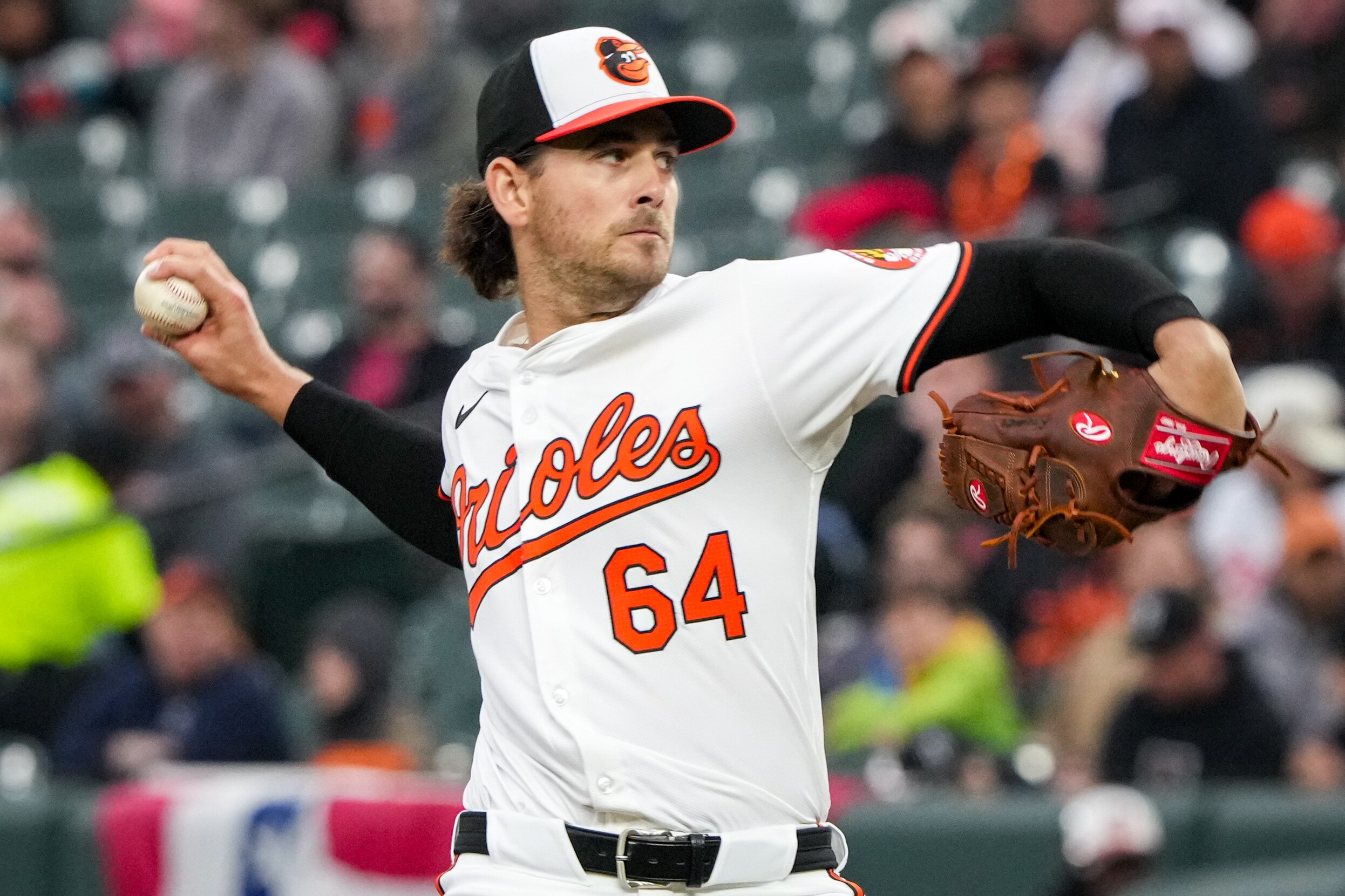 Baltimore Orioles starting pitcher Dean Kremer (64) delivers a pitch in a game against the Kansas City Royals on April 1.