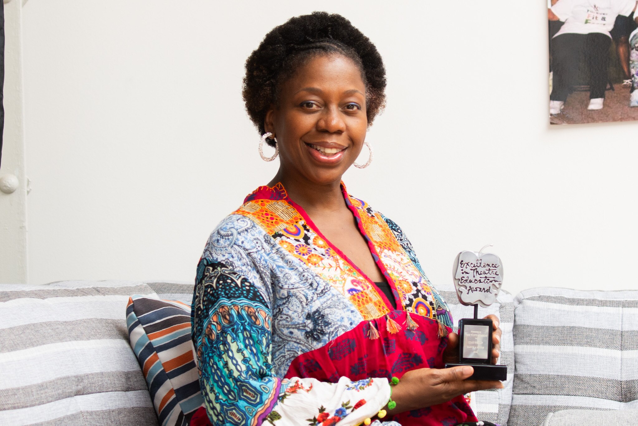 CJay Philip holds the Tony Award she recently received for excellence in theatre education.