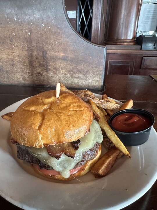 The $21 dollar "fancy" Penny Black Burger at the old-fashioned Fells Point tavern ranks atop my list of best non-smash burgers in Baltimore.