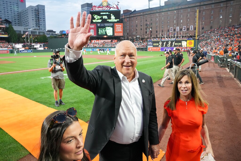 Fans give a standing ovation to Cal Ripken Jr. as he leaves the field during a pregame ceremony at Oriole Park at Camden Yards in Baltimore, Md., on Saturday, Sept. 6, 2025. Saturday is the 30th Anniversary of Cal Ripken Jr.’s achievement to play 2,131 games in a row, breaking Lou Gehrigh’s record, and cementing his own place in MLB history as the ‘Iron Man.’